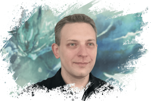 Anthony E. Kosky Profile Photo looking to the side with green and blue abstract art in the background.